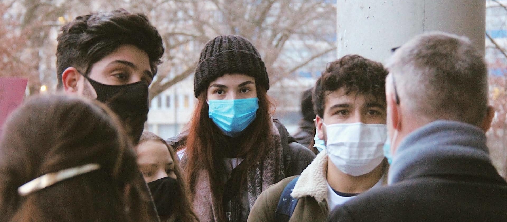 A group of people wearing Face Masks