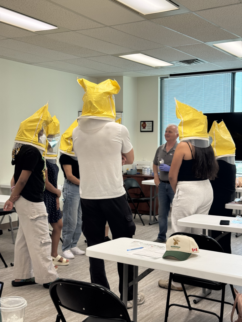 Group Mask Fit Test a group of nurses are doing a mask fit test guided by a MaskFit+ instructor